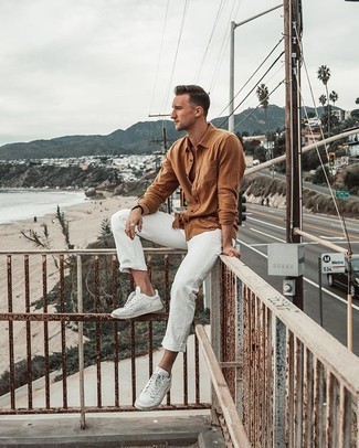 Tobacco Long Sleeve Shirt Outfits For Men: If the situation allows casual dressing, you can go for a tobacco long sleeve shirt and white jeans. The whole ensemble comes together perfectly if you throw in white leather low top sneakers.