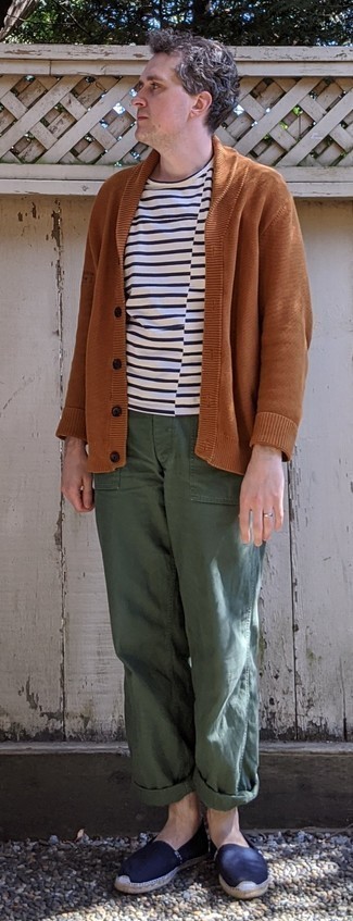 Dark Brown Cardigan Outfits For Men: This pairing of a dark brown cardigan and olive chinos looks awesome, but it's super easy to pull together. Let your outfit coordination savvy really shine by rounding off your getup with a pair of navy canvas espadrilles.