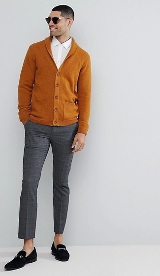 Brown Cardigan Outfits For Men: For rugged elegance with a modern take, you can opt for a brown cardigan and charcoal check dress pants. To bring a bit of classiness to your ensemble, add black suede loafers to the mix.