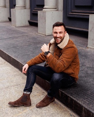 Brown Suede Chelsea Boots Outfits For Men: To create a casual look with a modern finish, go for a tobacco shearling jacket and black skinny jeans. A pair of brown suede chelsea boots instantly amps up the style factor of this ensemble.