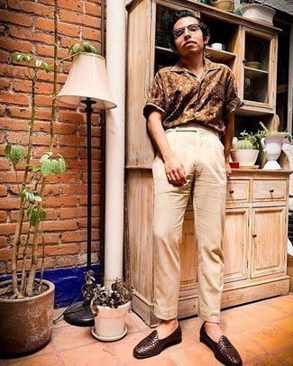 Men's Tobacco Print Short Sleeve Shirt, Beige Dress Pants, Dark Brown Woven Leather Loafers, Clear Sunglasses
