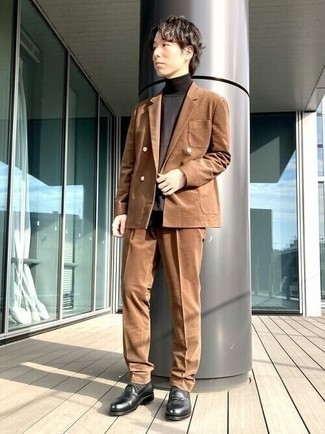 Tobacco Suit Outfits: This combination of a tobacco suit and a dark brown turtleneck will add classy essence to your ensemble. Round off with black leather loafers and the whole ensemble will come together.
