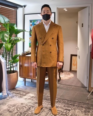 Tobacco Suit Outfits: You're looking at the hard proof that a tobacco suit and a white dress shirt are awesome when married together in a refined outfit for a modern man. Put a fresh spin on an otherwise mostly classic getup by rounding off with tan suede loafers.