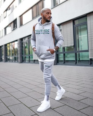 White Print Socks Outfits For Men: Parade your chops in menswear styling by teaming a grey track suit and white print socks for an edgy ensemble. Feeling brave today? Mix things up by wearing white canvas low top sneakers.