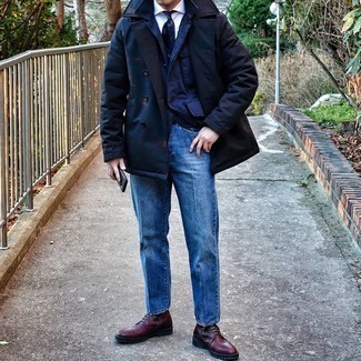 Navy Trenchcoat Outfits For Men: This smart combo of a navy trenchcoat and blue jeans is very easy to pull together in next to no time, helping you look amazing and prepared for anything without spending too much time rummaging through your wardrobe. A pair of burgundy leather casual boots is a goofproof footwear style that's full of character.