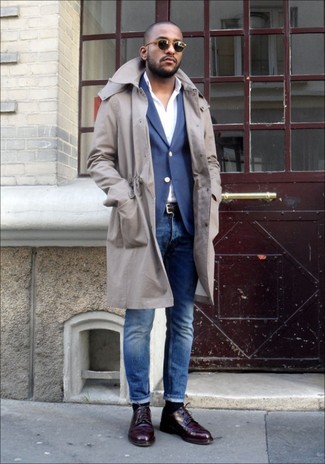 Red Leather Derby Shoes Outfits: If the dress code calls for a smart getup, try pairing a beige trenchcoat with blue jeans. Why not complete this getup with red leather derby shoes for a sense of class?