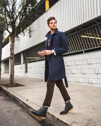 Black Suede Snow Boots Outfits For Men: For an ensemble that's super straightforward but can be smartened up or dressed down in a myriad of different ways, consider pairing a navy trenchcoat with dark brown chinos. To give your overall ensemble a more laid-back touch, add black suede snow boots to the equation.