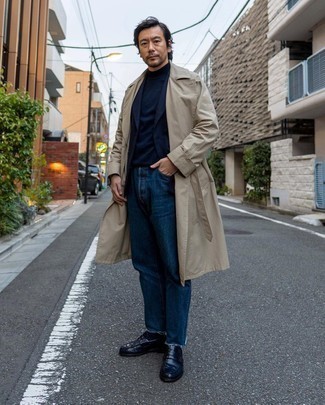 500+ Chill Weather Outfits For Men: For a winning classic and casual option, you can never go wrong with this combo of a tan trenchcoat and navy jeans. If you need to effortlessly dial up your getup with shoes, complement this look with a pair of navy leather loafers.