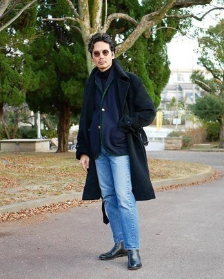 Navy Turtleneck Outfits For Men: Team a navy turtleneck with light blue jeans for both sharp and easy-to-wear ensemble. And if you need to instantly level up this outfit with one single piece, why not complement your look with a pair of black leather chelsea boots?