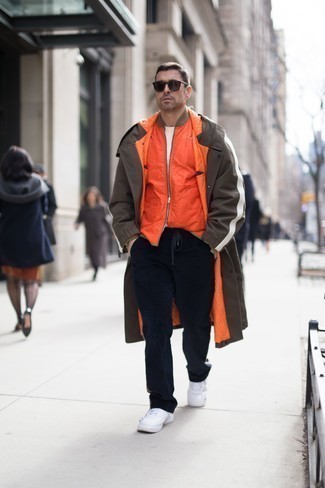 Orange Quilted Bomber Jacket Outfits For Men: An orange quilted bomber jacket and navy corduroy chinos combined together are the perfect outfit for men who appreciate casually dapper getups. Let your expert styling really shine by rounding off this look with a pair of white leather low top sneakers.