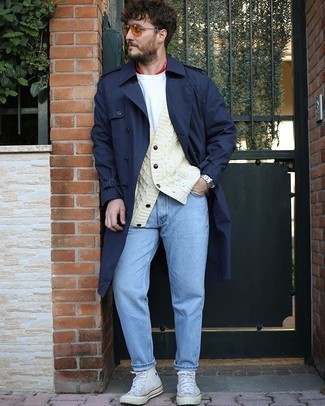 Knit Cardigan Outfits For Men: A knit cardigan and light blue jeans? It's an easy-to-create outfit that anyone could work on a day-to-day basis. Hesitant about how to finish off? Introduce a pair of white canvas high top sneakers to this getup to mix things up.