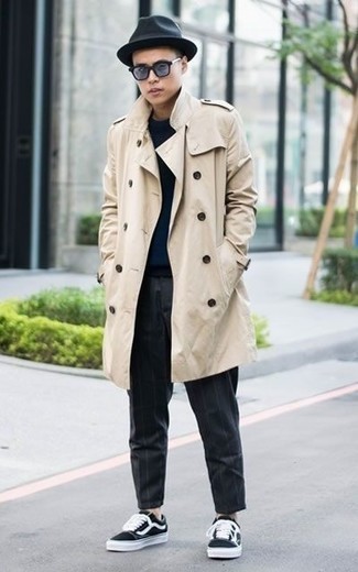 Men's Beige Trenchcoat, Navy Crew-neck Sweater, Charcoal Vertical Striped Chinos, Black and White Canvas Low Top Sneakers