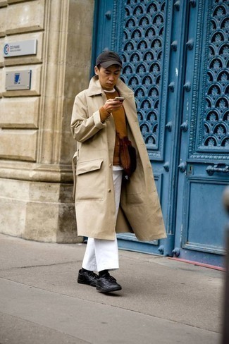 Tobacco Suede Messenger Bag Outfits: Go for a straightforward but laid-back and cool look by wearing a beige trenchcoat and a tobacco suede messenger bag. Now all you need is a cool pair of black leather low top sneakers to round off your look.