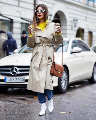 White Leather Ankle Boots Smart Casual Outfits: Go for something casual yet trendy in a beige trenchcoat and blue jeans. The whole ensemble comes together when you complete this getup with a pair of white leather ankle boots.