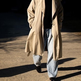 Trenchcoat Outfits For Men: The go-to for casually smart menswear style? A trenchcoat with light blue jeans. Finishing with a pair of black leather loafers is a fail-safe way to bring an extra dose of elegance to your ensemble.