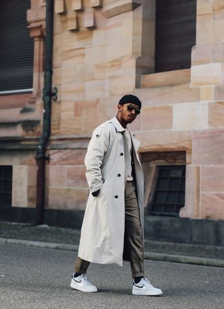 Tobacco Chinos Outfits: For an ensemble that's effortlessly classic and gasp-worthy, consider wearing a grey trenchcoat and tobacco chinos. Wondering how to round off? Complement your getup with a pair of grey leather low top sneakers for a more laid-back take.