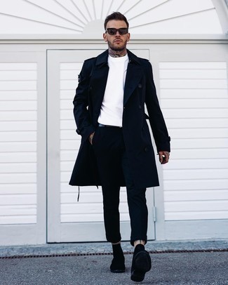 Black Suede Chelsea Boots Outfits For Men: This pairing of a navy trenchcoat and black chinos is truly a statement-maker. Finishing with a pair of black suede chelsea boots is the most effective way to give a hint of refinement to your look.
