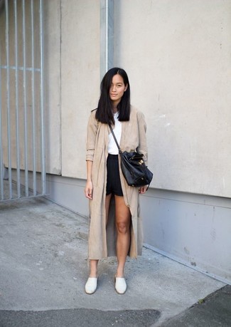Tan Trenchcoat Outfits For Women: Display your styling prowess in this off-duty combination of a tan trenchcoat and black shorts. Add a pair of white leather mules to the equation to immediately boost the style factor of any look.