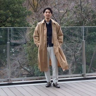 Tan Trenchcoat Outfits For Men: A tan trenchcoat and white jeans are among those sport-anywhere-anytime items that have become the fundamental elements in any guy's collection. And if you need to effortlessly level up this look with a pair of shoes, slip into black leather loafers.