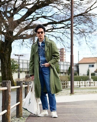 White Canvas High Top Sneakers Outfits For Men: For a smart casual menswear style, consider teaming an olive trenchcoat with blue jeans — these pieces work really cool together. You can get a bit experimental in the shoe department and introduce a pair of white canvas high top sneakers to the equation.