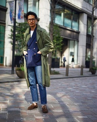 Olive Trenchcoat Outfits For Men: You'll be amazed at how extremely easy it is for any gent to get dressed this way. Just an olive trenchcoat worn with blue jeans. Let's make a bit more effort with shoes and complement your ensemble with a pair of brown suede loafers.