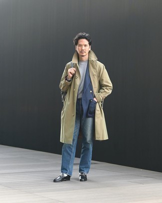 Trenchcoat Outfits For Men: Wear a trenchcoat with navy jeans to achieve new heights in outfit coordination. Breathe an element of polish into this outfit by rounding off with black leather loafers.