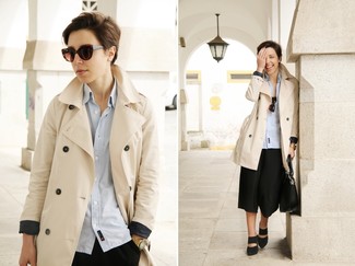 Tan Trenchcoat Outfits For Women: If you're searching for a laid-back yet totaly stylish getup, wear a tan trenchcoat with black culottes. Bring a more elegant twist to an otherwise mostly dressed-down getup by wearing a pair of black suede mules.