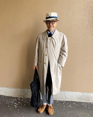 Tan Bucket Hat Outfits For Men: If you prefer a more casual approach to menswear, why not go for a beige trenchcoat and a tan bucket hat? Give an added touch of style to your ensemble by finishing off with tan suede desert boots.