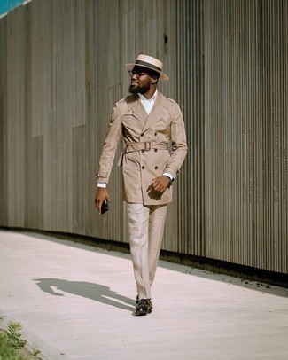 Beige Straw Hat Outfits For Men: Choose a tan trenchcoat and a beige straw hat to pull together an incredibly stylish and off-duty outfit. Our favorite of an infinite number of ways to finish this getup is with a pair of black fringe leather loafers.