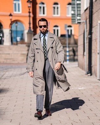 Teal Print Tie Outfits For Men: For a look that's refined and absolutely wow-worthy, dress in a grey trenchcoat and a teal print tie. And if you want to easily dress down your outfit with a pair of shoes, add burgundy leather derby shoes to this look.