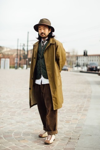 Trenchcoat Outfits For Men: Ramp up your casual style game by putting together a trenchcoat and brown corduroy chinos. When in doubt about the footwear, add a pair of beige suede casual boots to this outfit.