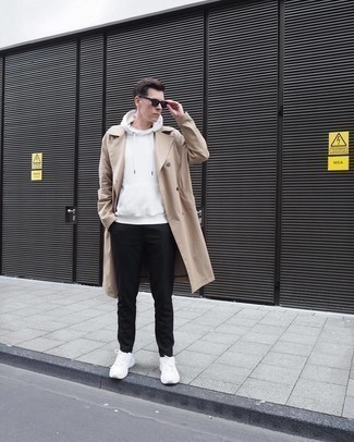 White Hoodie Outfits For Men: Demonstrate your expertise in menswear styling by opting for this off-duty pairing of a white hoodie and black chinos. Serve a little outfit-mixing magic by rocking a pair of white athletic shoes.