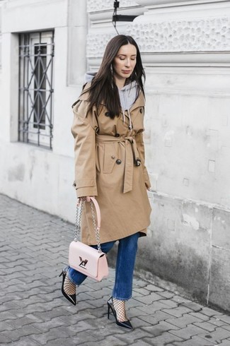 Black Tights Outfits: For something more on the off-duty side, consider pairing a tan trenchcoat with black tights. To bring an extra dimension to this outfit, complete your ensemble with a pair of black leather pumps.
