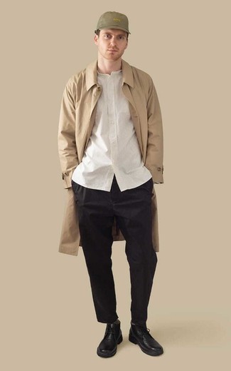 Trenchcoat Outfits For Men: Putting together a trenchcoat with black chinos is an on-point pick for a semi-casual getup. Take your getup down a less formal path by sporting a pair of black leather desert boots.