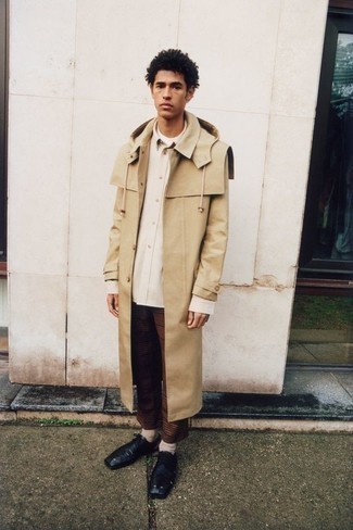 Tan Trenchcoat Outfits For Men: Marry a tan trenchcoat with brown plaid chinos to pull together an interesting and modern-looking outfit. With shoes, go for something on the smarter end of the spectrum and complement this outfit with a pair of black leather derby shoes.