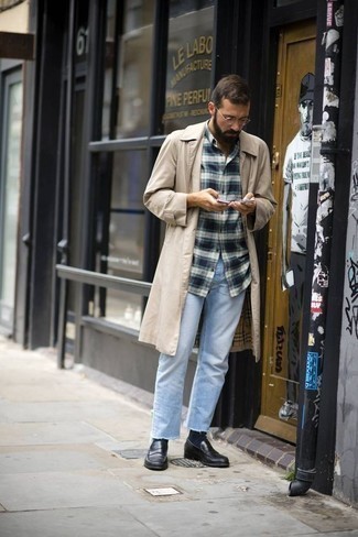 Tan Trenchcoat Outfits For Men: This combo of a tan trenchcoat and light blue jeans is on the line between classic and off-duty. If you want to break out of the mold a little, go for a pair of black leather loafers.