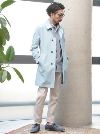 Blue Shoes Outfits For Men: A light blue trenchcoat and beige jeans teamed together are a nice match. To bring a bit of fanciness to this ensemble, introduce blue canvas derby shoes to your getup.