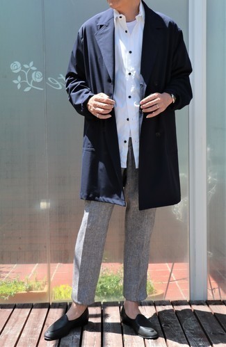Navy Trenchcoat Outfits For Men: This combo of a navy trenchcoat and grey herringbone chinos is perfect for dressier settings. Tone down the casualness of this look by finishing with a pair of black leather loafers.