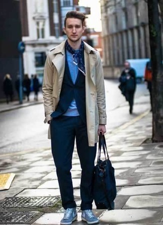 Tan Trenchcoat Outfits For Men: Teaming a tan trenchcoat and a navy suit is a surefire way to infuse your closet with some rugged elegance. And if you want to immediately play down this look with shoes, complement your ensemble with a pair of light blue canvas high top sneakers.