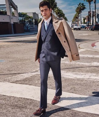 Burgundy Leather Loafers Outfits For Men: We love how this combo of a tan trenchcoat and a navy suit instantly makes you look polished and stylish. For times when this look is just too much, dial it down by rocking burgundy leather loafers.