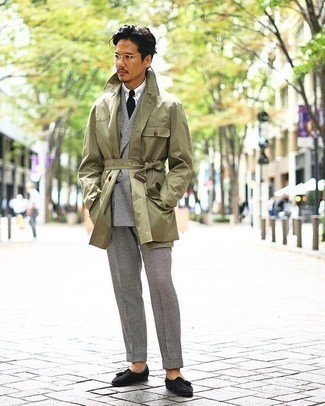 Olive Trenchcoat Outfits For Men: Consider teaming an olive trenchcoat with a black and white houndstooth suit for seriously dapper attire. The whole look comes together wonderfully if you complement your outfit with black suede tassel loafers.