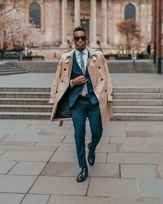 Teal Suit Outfits: To look sleek and smart, choose a teal suit and a tan trenchcoat. Add a pair of black leather brogues to this ensemble to effortlessly boost the style factor of your look.