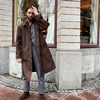 Dark Brown Trenchcoat Outfits For Men: Teaming a dark brown trenchcoat and a grey suit is a fail-safe way to infuse your styling rotation with some masculine sophistication. And if you want to immediately dress down this getup with shoes, why not introduce dark brown suede casual boots to this getup?