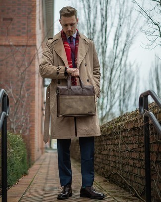 Trenchcoat Outfits For Men: Combining a trenchcoat with a navy suit is a savvy option for a smart and refined outfit. A pair of dark brown leather oxford shoes integrates well within a myriad of outfits.