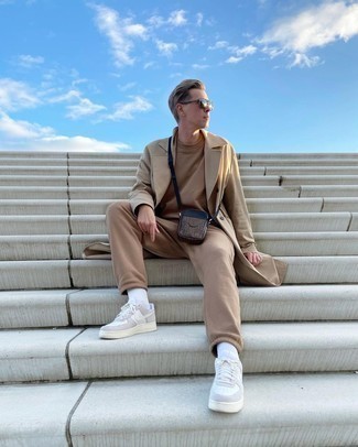 Men's Tan Trenchcoat, Tan Track Suit, White Leather Low Top Sneakers, Dark Brown Leather Messenger Bag