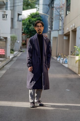 Navy Trenchcoat Outfits For Men: Try pairing a navy trenchcoat with grey chinos and get ready to be treated like a true expert in modern men's style. Take your outfit in a more informal direction by rocking a pair of dark brown canvas low top sneakers.