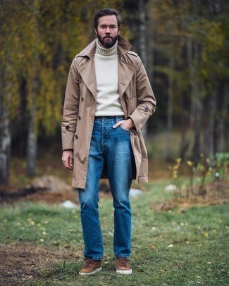 Brown Suede Low Top Sneakers Outfits For Men: For a casually classic look, make a tan trenchcoat and blue jeans your outfit choice — these two items go beautifully together. Finishing with brown suede low top sneakers is a guaranteed way to inject a more casual twist into your look.