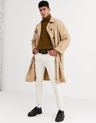 Tan Trenchcoat Outfits For Men: Pairing a tan trenchcoat and white jeans is a surefire way to inject your styling rotation with some masculine elegance. Complement your getup with a pair of black leather desert boots to instantly boost the street cred of your outfit.
