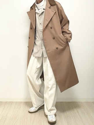 Tan Trenchcoat Outfits For Men: One of the best ways for a man to style out such a functional piece as a tan trenchcoat is to combine it with white chinos. To give your overall look a more laid-back finish, why not complement this outfit with white leather low top sneakers?