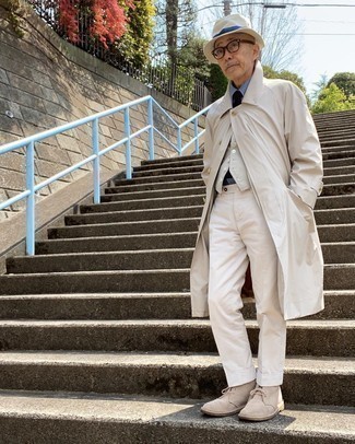 Light Blue Dress Shirt Chill Weather Outfits For Men: This sophisticated combo of a light blue dress shirt and white dress pants is a must-try outfit for any modern man. When this look appears all-too-fancy, dress it down by slipping into a pair of beige suede desert boots.